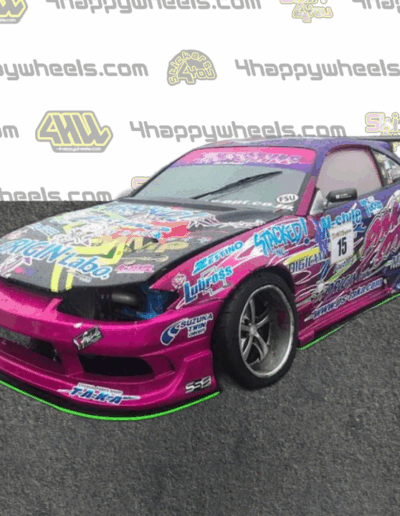 Front view of a 1:10 scale model of a drift car with Pink Style graphics
