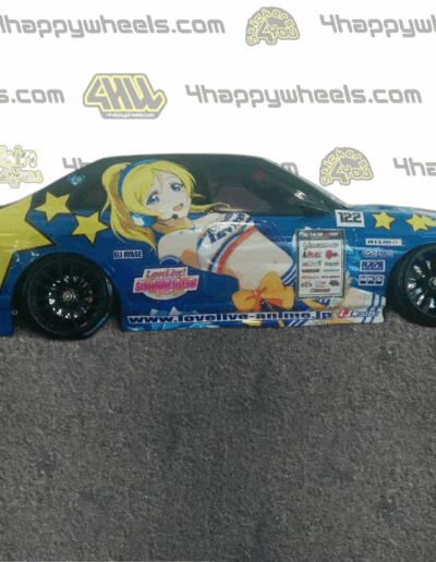 Right side view of a 1/10 scale model drift car with Love Live! graphics